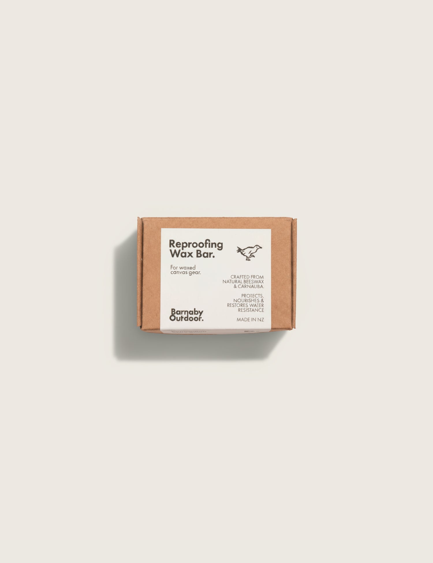 Barnaby Outdoor Reproofing Wax Bar packaging on a light gray background