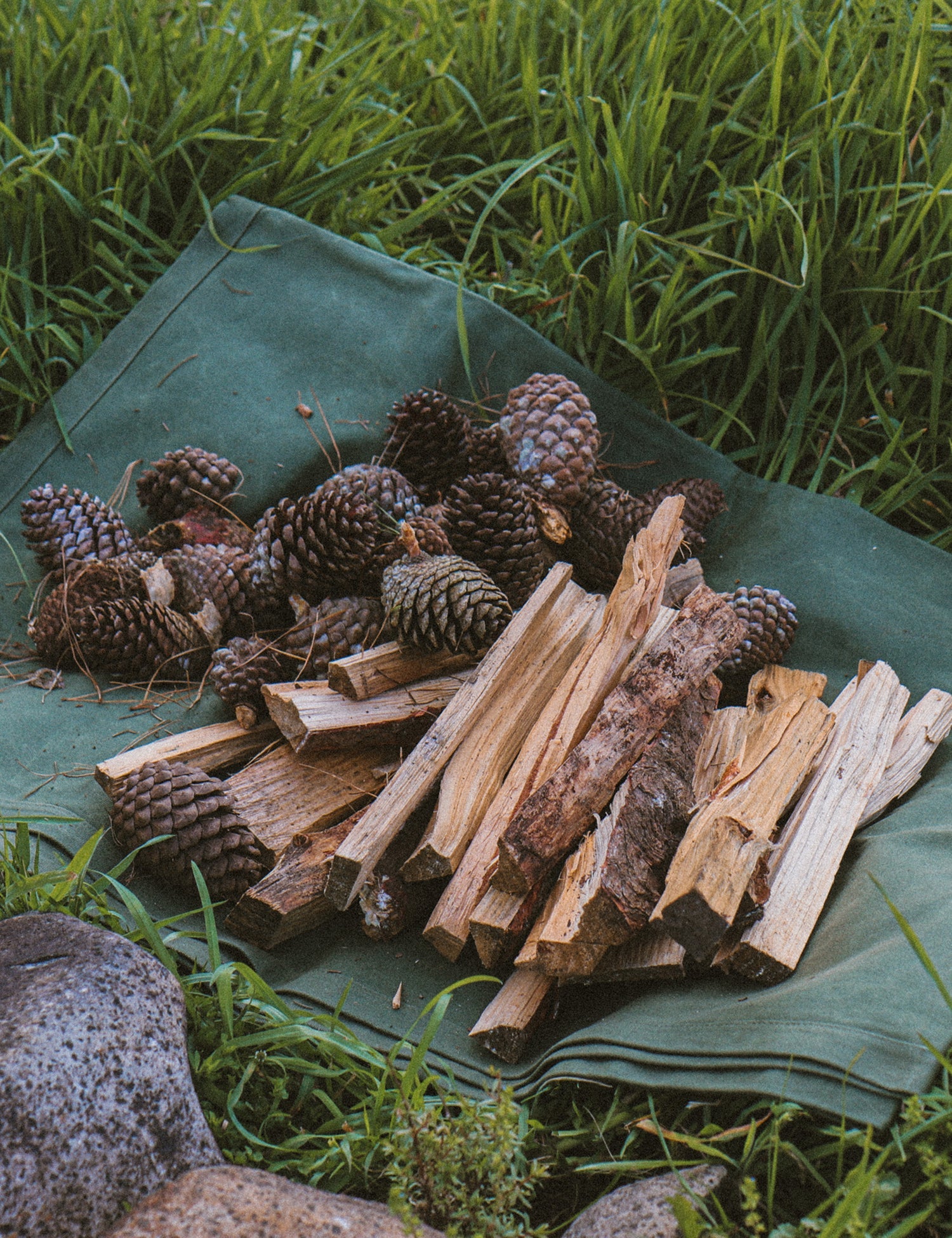 Waxed canvas holding kindling for a fire